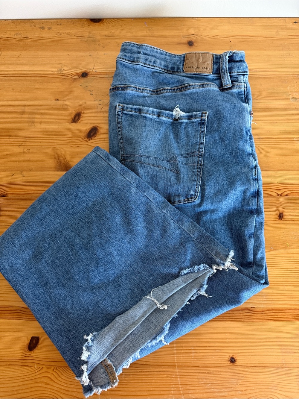 American Eagle Outfitters Men's Medium Blue Straight Jeans with Frayed Hem
